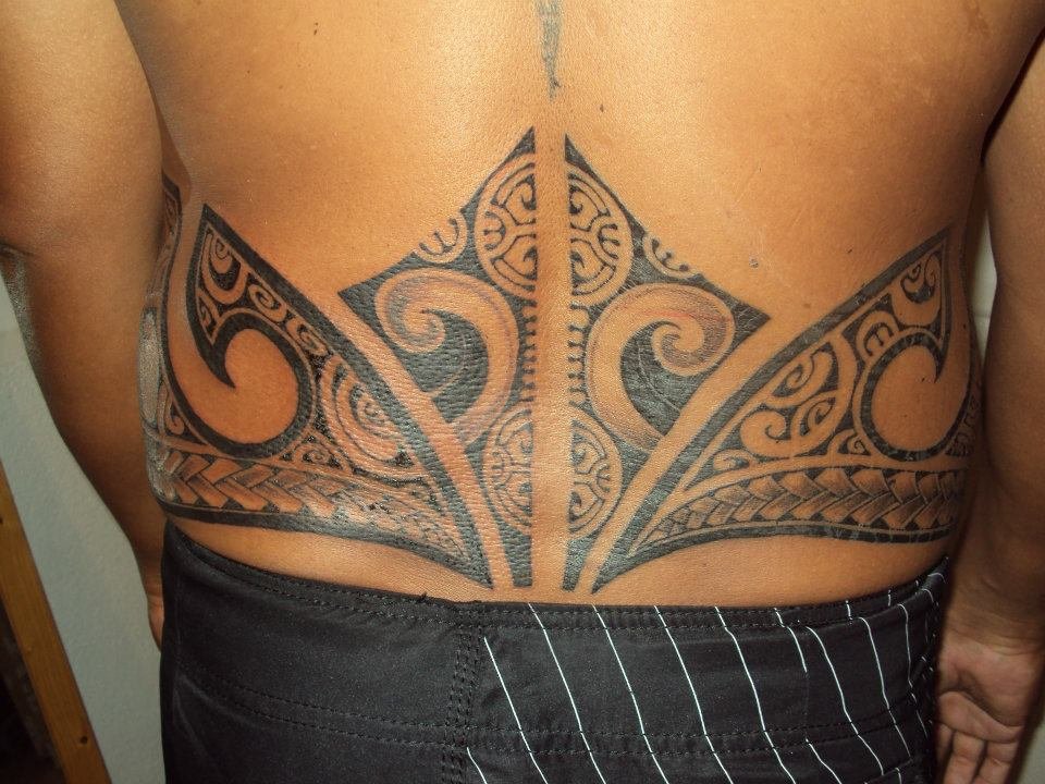 Hawaiian Lower Back Tattoo For Men